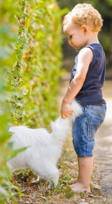 Toddler with cat